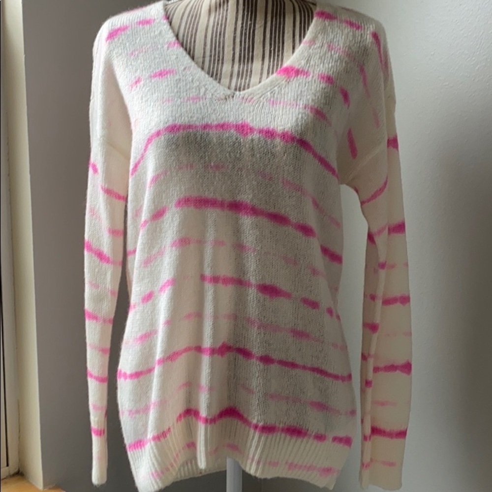 Jennifer Lopez pullover sweater.